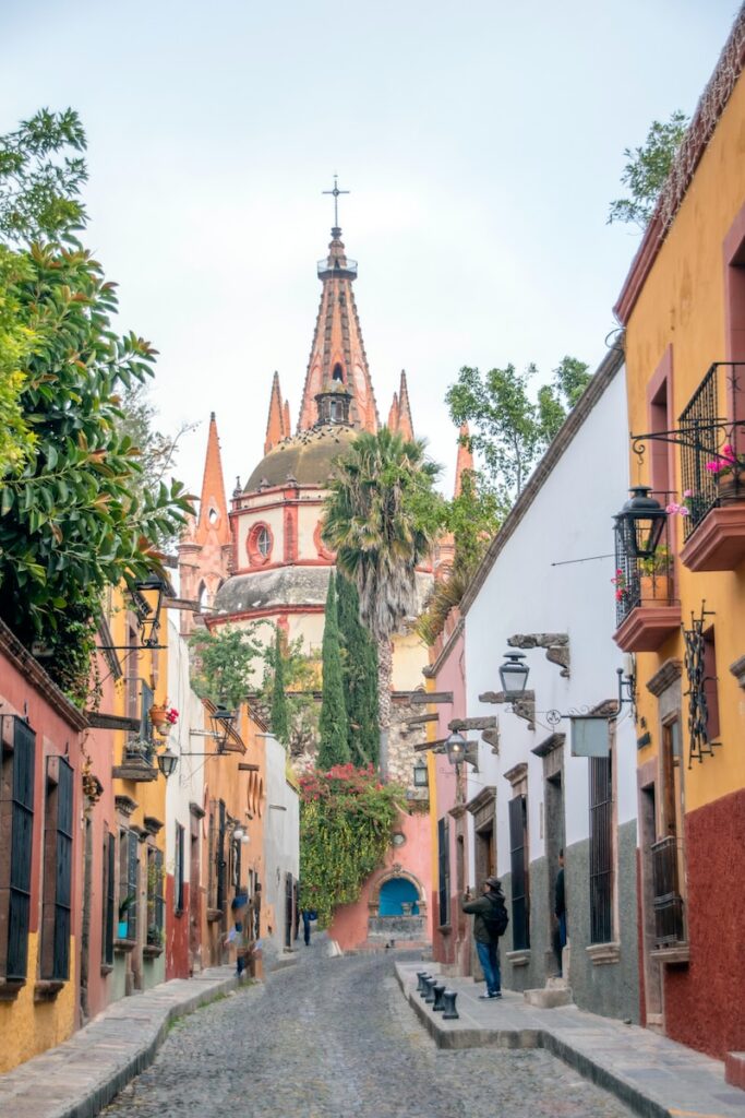 San Miguel de Allende people walking on street near buildings during daytime