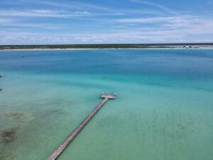 a long dock going into a body of water